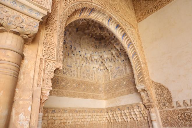 Carved Nasrid stucco vault inside the Alhambra.