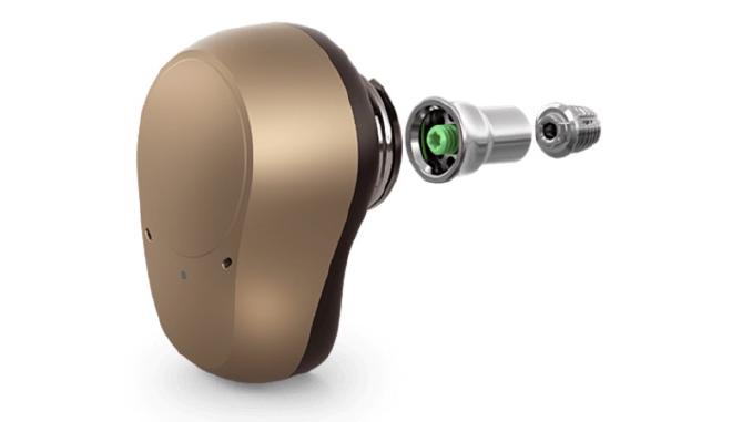 An Oticon Ponto 5 bone-anchored hearing aid mounted on a titanium abutment